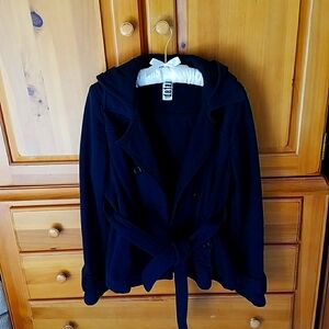 Winter black jacket. Short waisted.New condition. Very soft and comfortable.